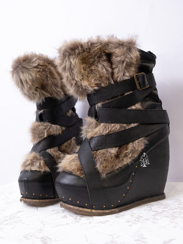 EU42 BEAST BLACK FUR-LINED CROSS-STRAP WEDGE BOOTS