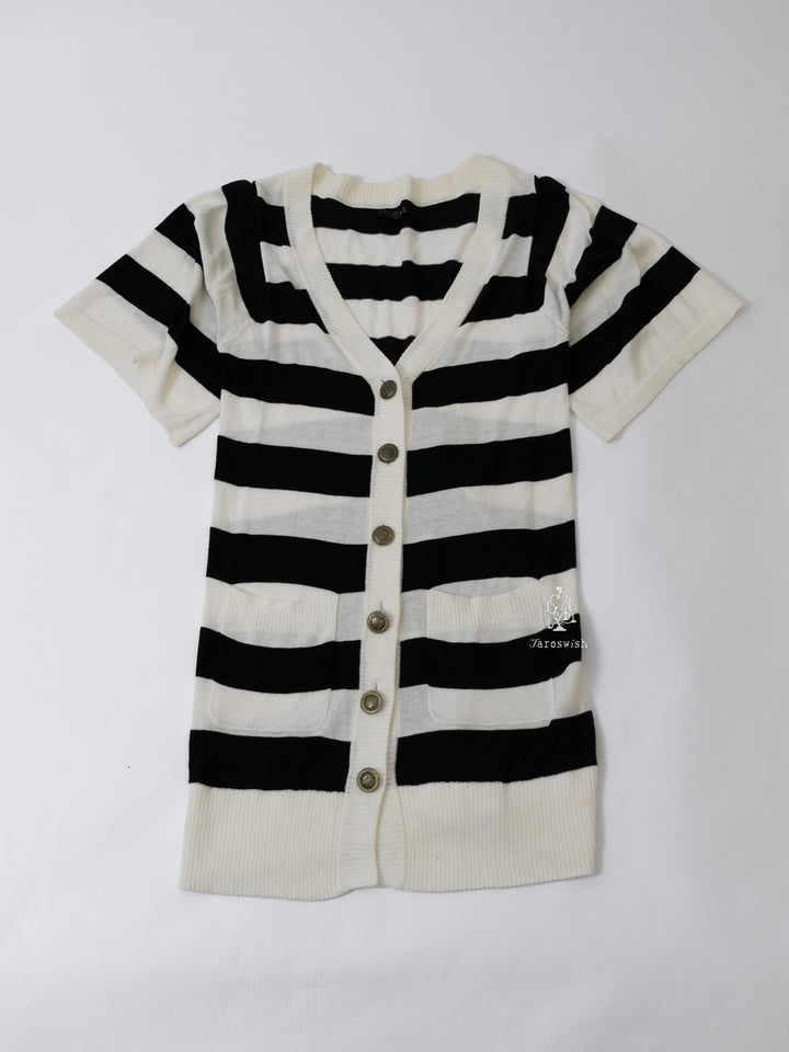 Short-sleeve black and white striped cardigan with front buttons and pockets.