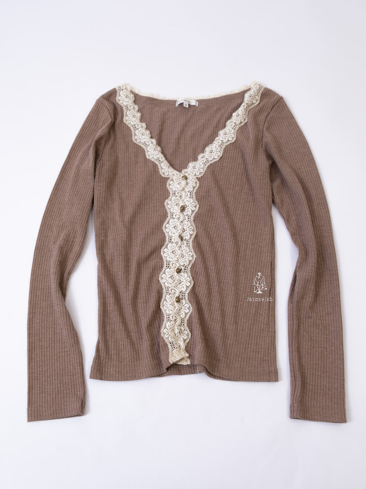 Brown ribbed long-sleeve top with cream lace trim along the neckline and front placket.