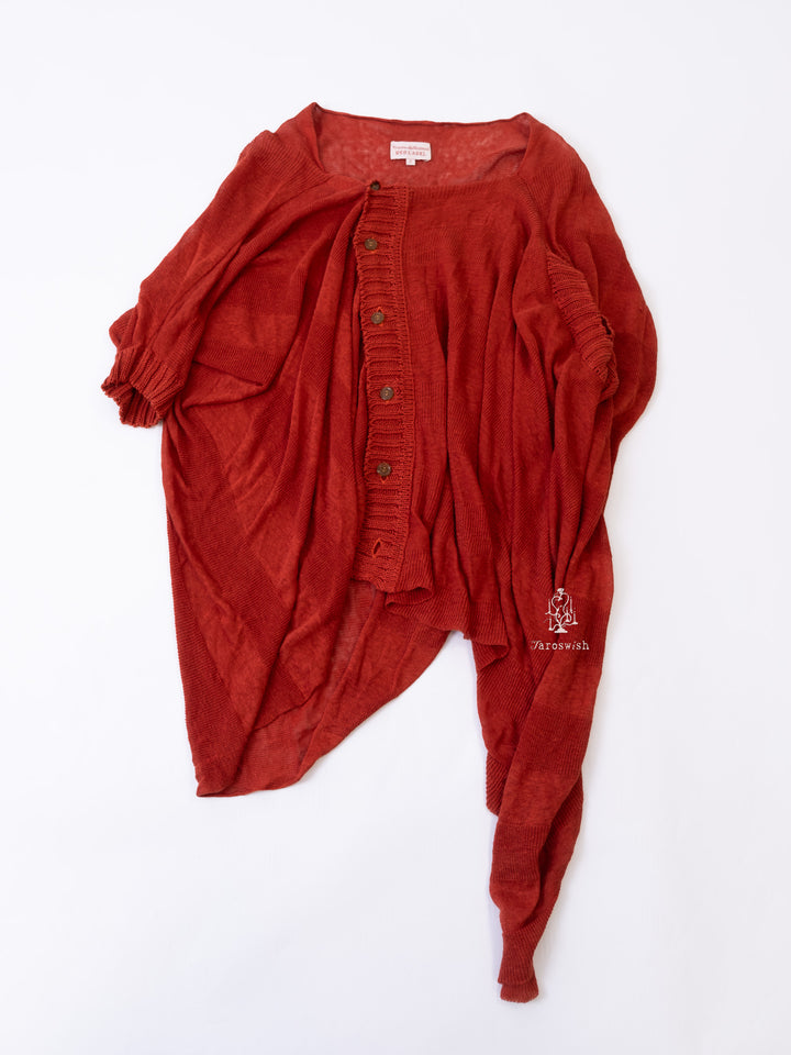 Red Vivienne Westwood cardigan with draped asymmetric silhouette and button front.