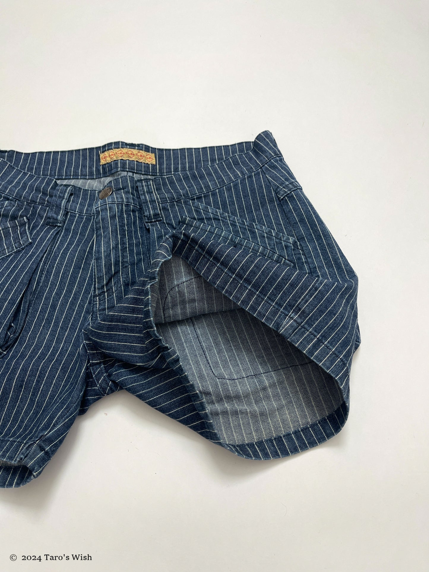 strip navy shorts, euro label