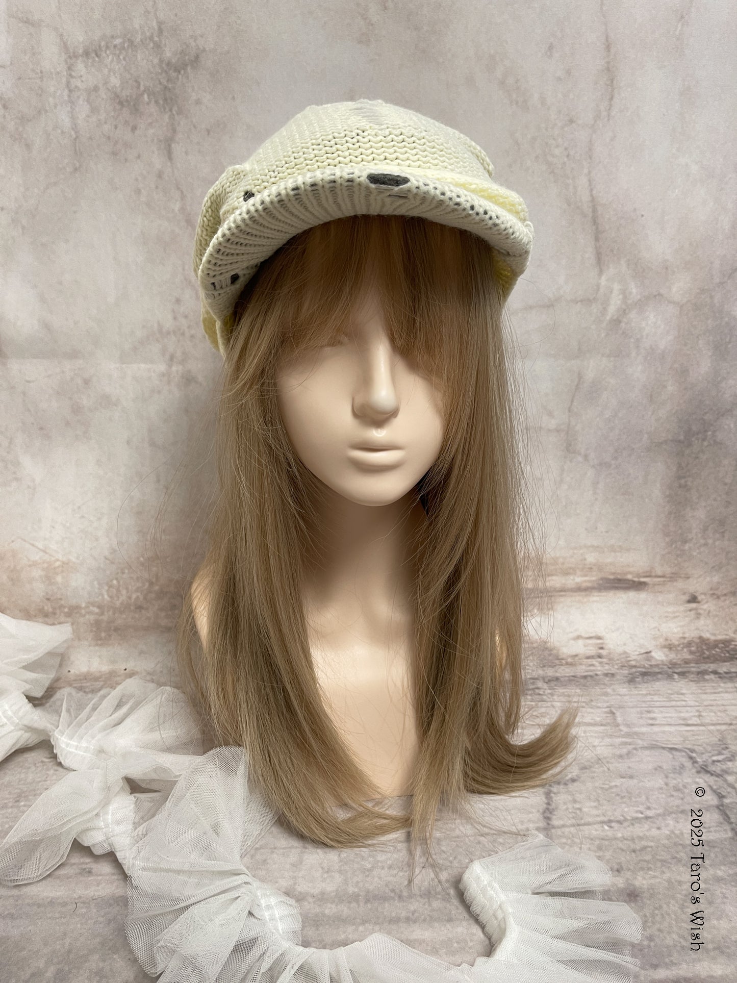 distressed knit cream ruched cap