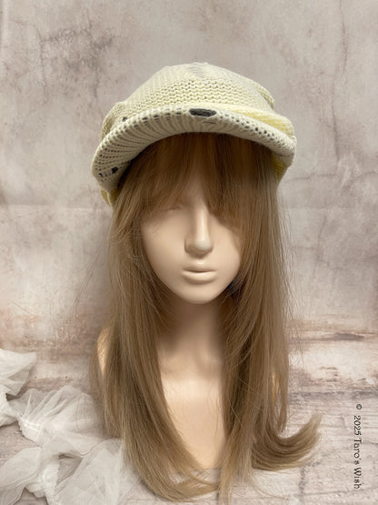 distressed knit cream ruched cap