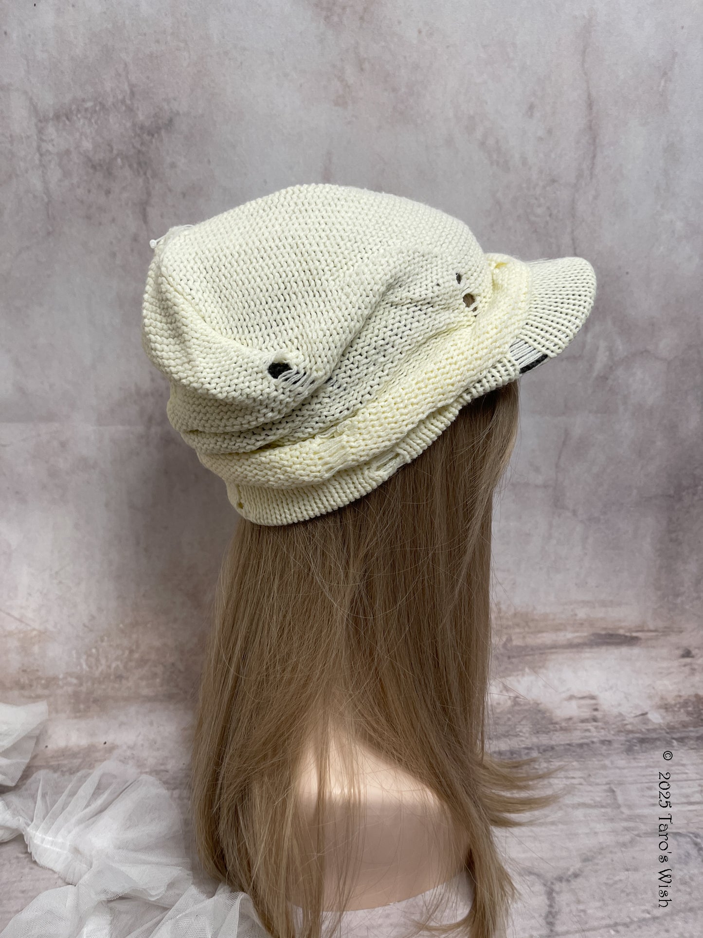 distressed knit cream ruched cap