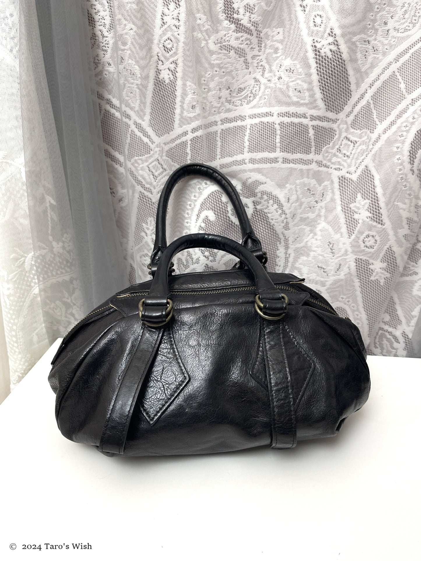 genuine leather boston bag with large orb pendant, japanese label vivienne westwood