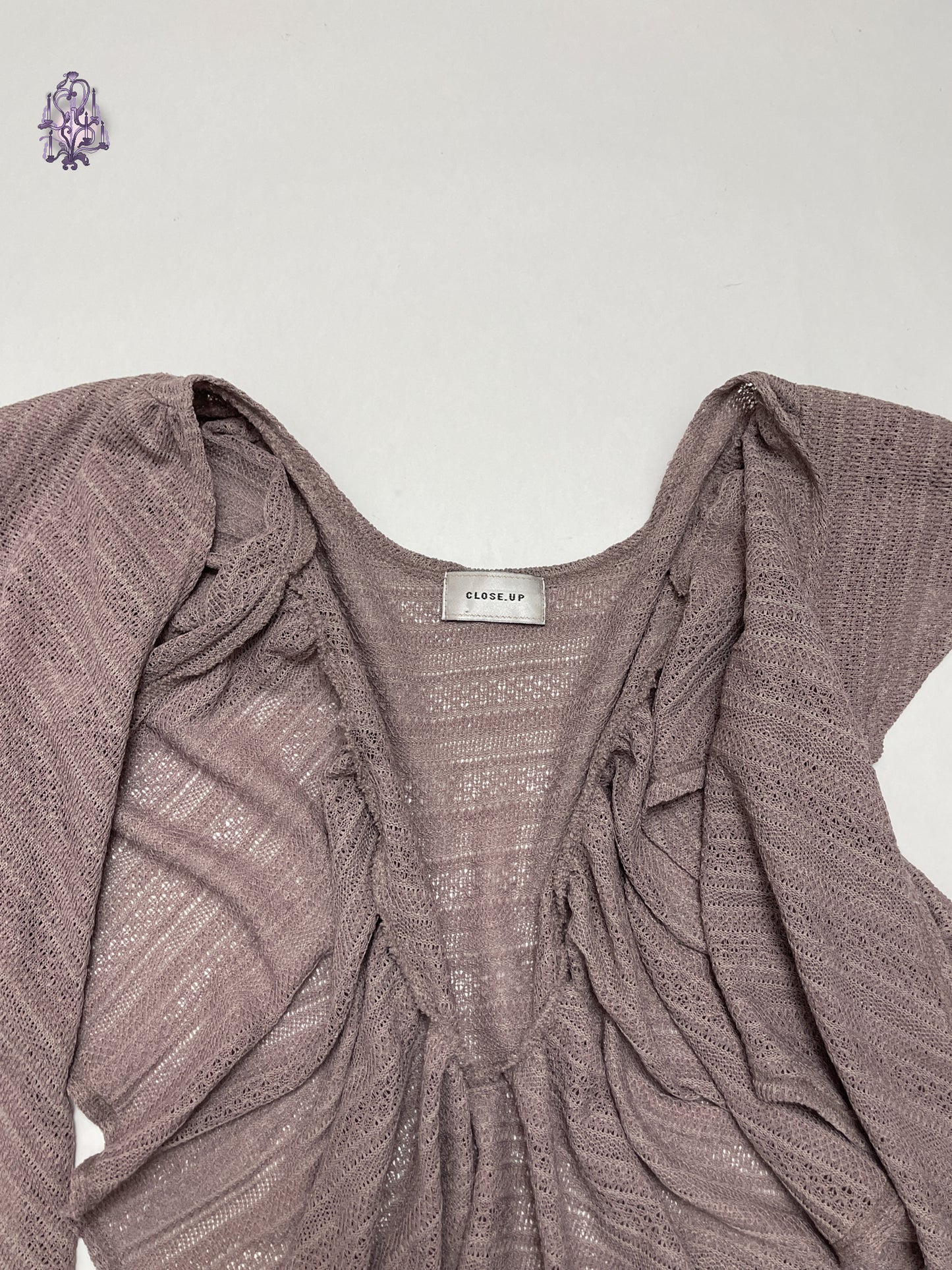 muted lilac elf bolero, japanese label closeup